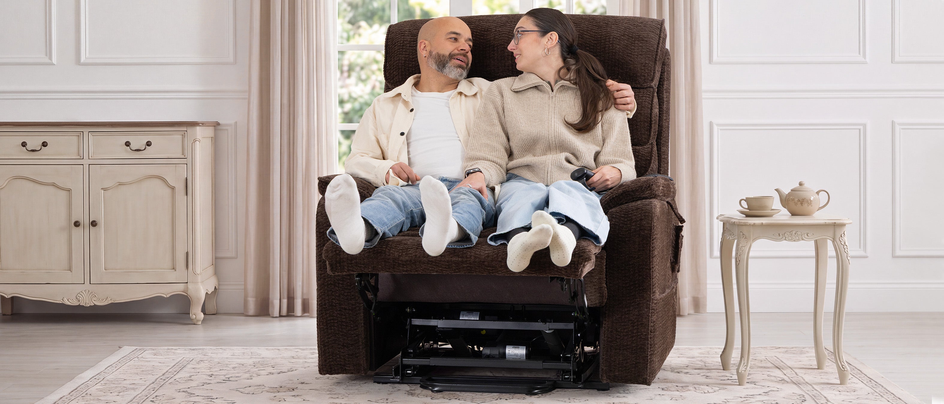 Person reclined in the Irene House 9188ET big and tall lift recliner with the extended footrest fully supporting their feet instead of leaving them dangling