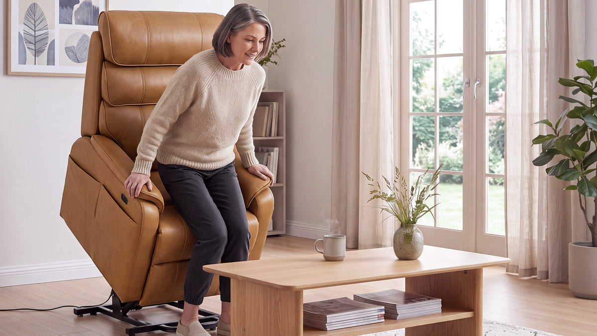 Irene House 9188S Pro in cream white chenille with the seat raised in lift position, helping the user stand up