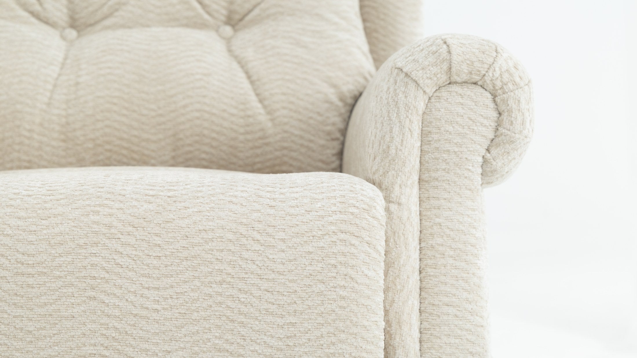 Close-up of the cream chenille tufted back and rolled arm on the Irene House 9199