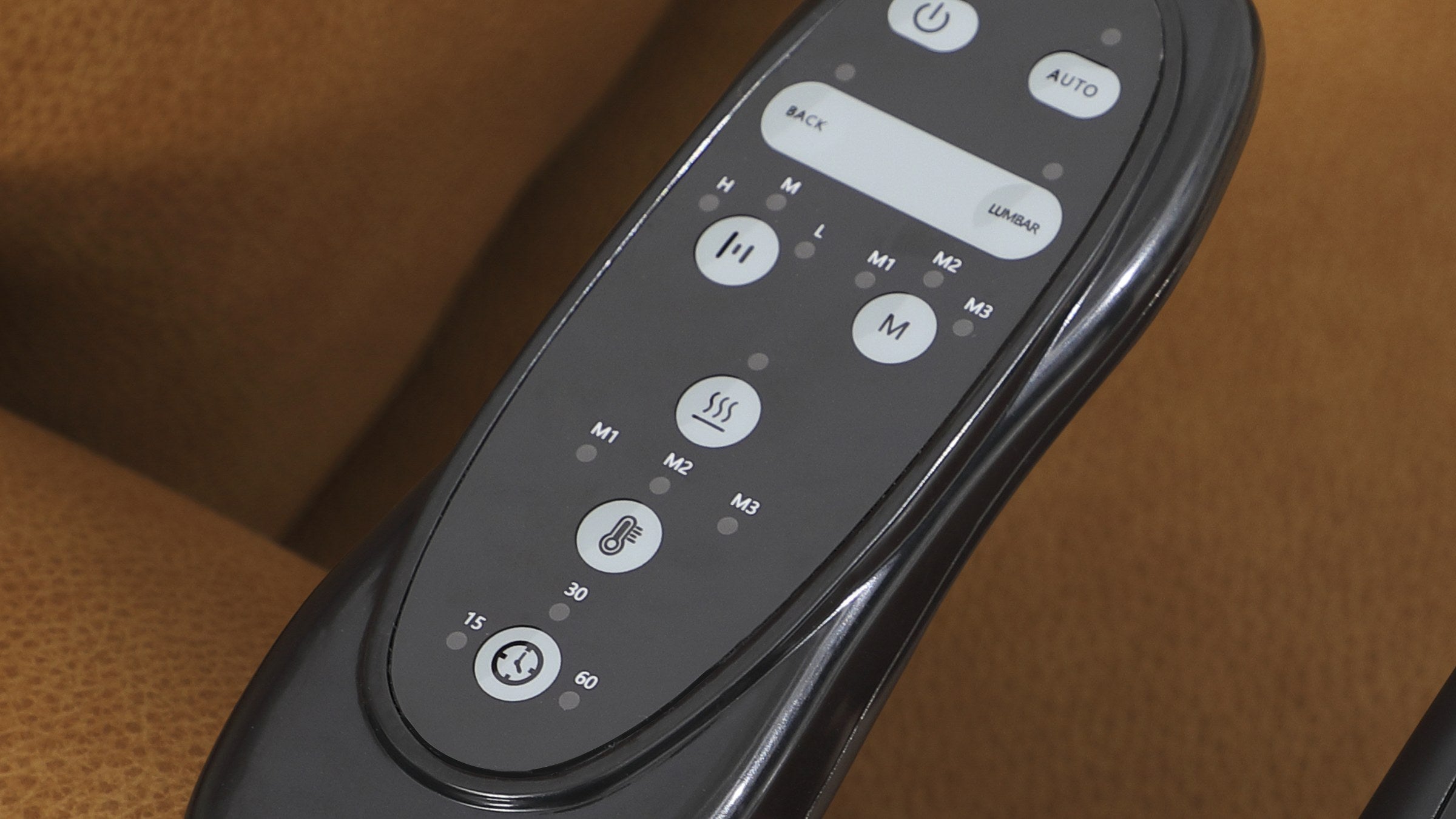 The Irene House 9219 heat and massage hand control, showing power, AUTO, BACK and LUMBAR zones, intensity, mode, heat and timer buttons