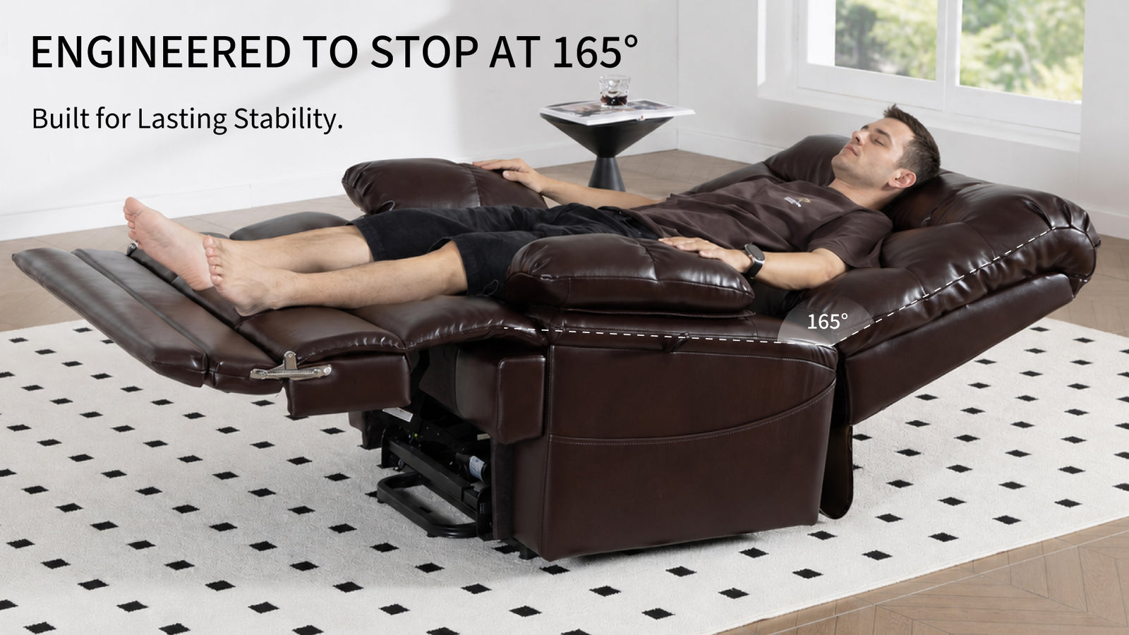 Man resting at the Irene House 9205 EWT500's engineered 165-degree recline, extended footrest supporting his legs from head to heel