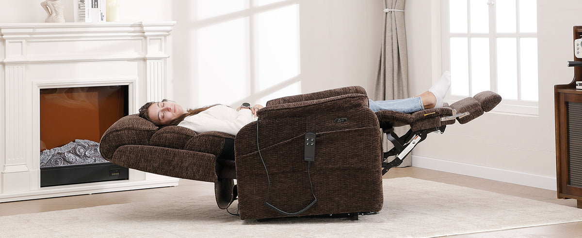Irene House lift recliner reclined past flat, footrest raised so the legs sit above hip level