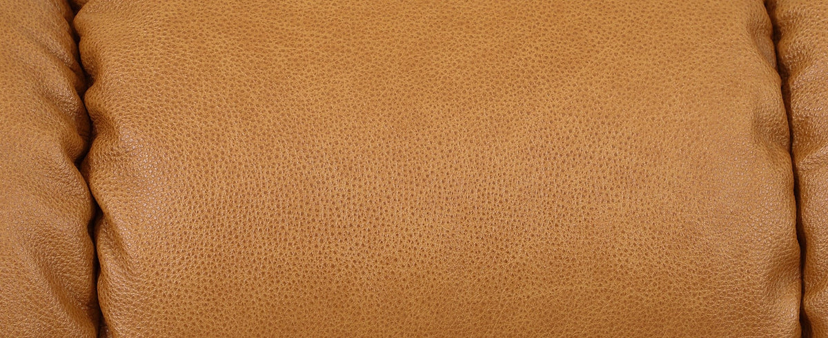 Close-up of camel brown top grain leather and channel stitching on the Irene House 9205L backrest